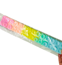 Load image into Gallery viewer, Grip Strips Popping Suction Toy
