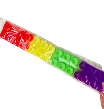 Load image into Gallery viewer, Grip Strips Popping Suction Toy
